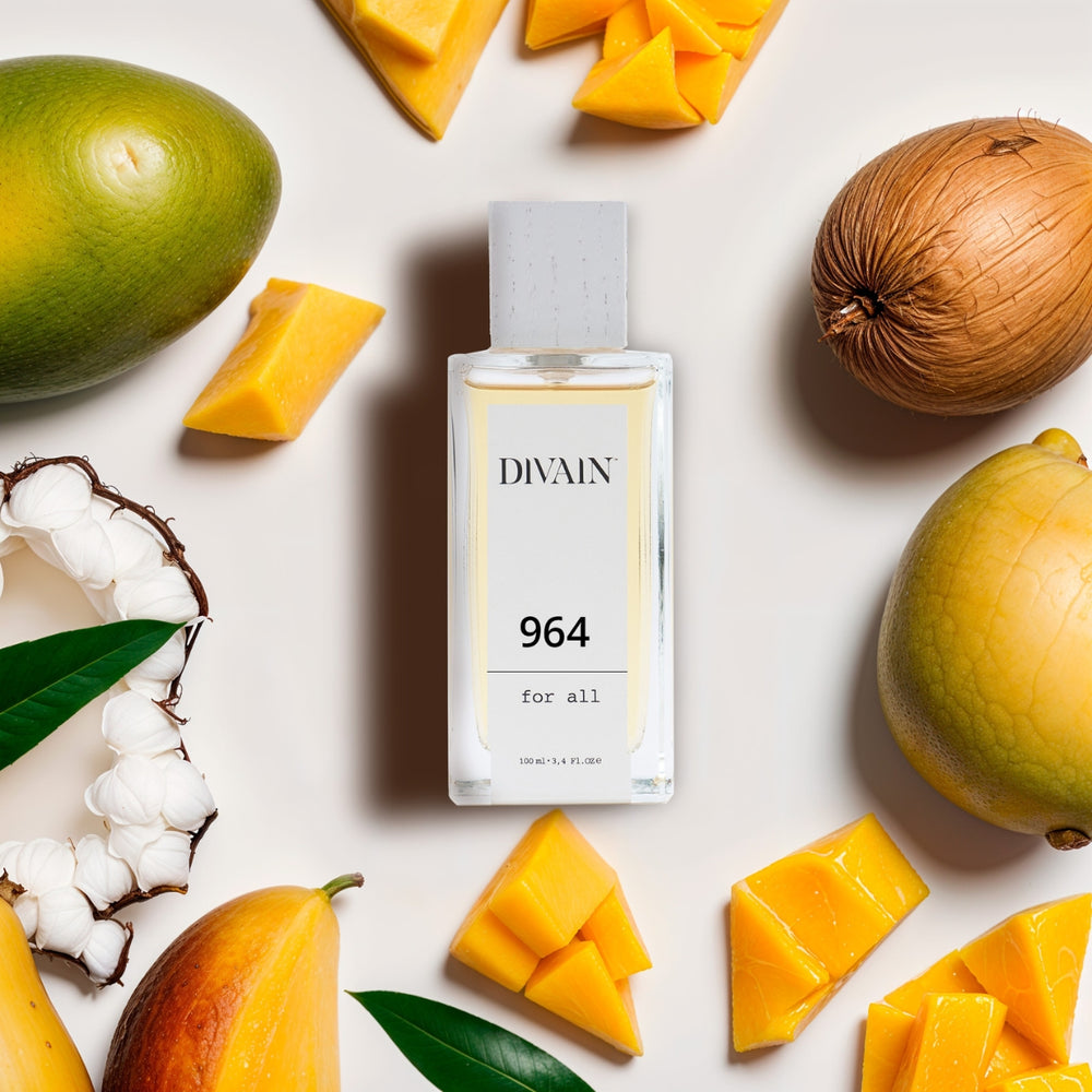 Perfume divain-964 rodeado de sus notas olfativas como el mango y la pera